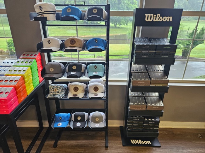 Golf hats and golf balls available at Penderbrook Golf Club