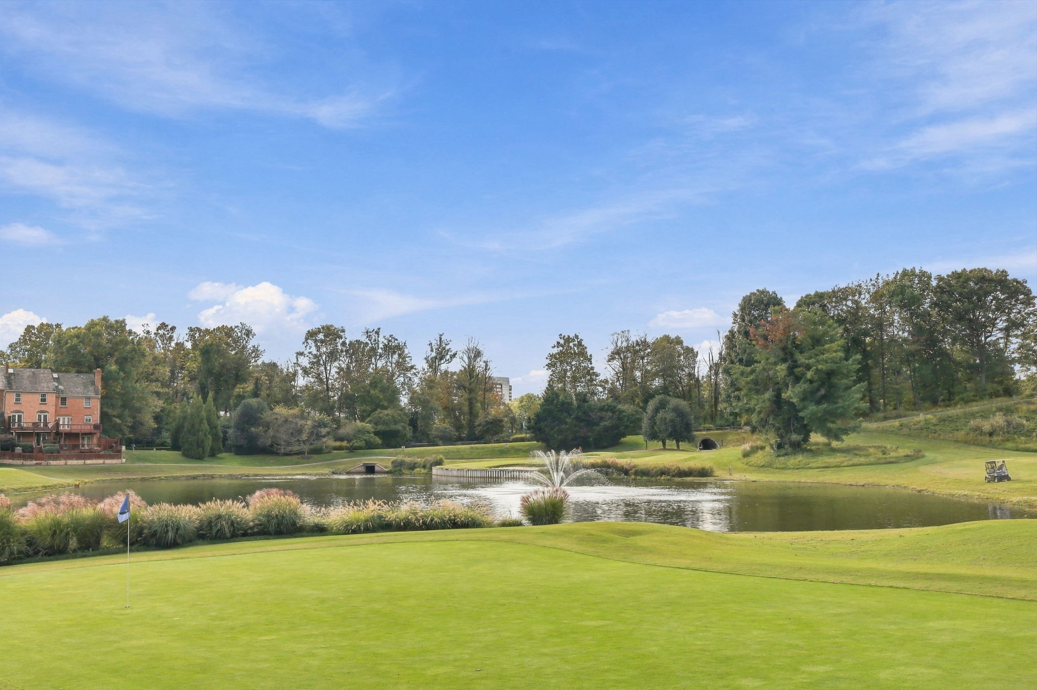 Penderbrook Golf Club — Green overlooking a pond and fountain Green overlooking a pond and fountain at Penderbrook Golf Club in Fairfax, Virginia